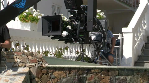 Red pro camera arrached to a jib Stock Footage 33940983