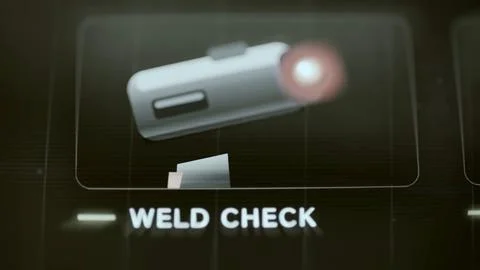 Red probe tip appears above weld sample Stock Photos