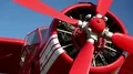 Red propeller-driven aircraft HD Footage