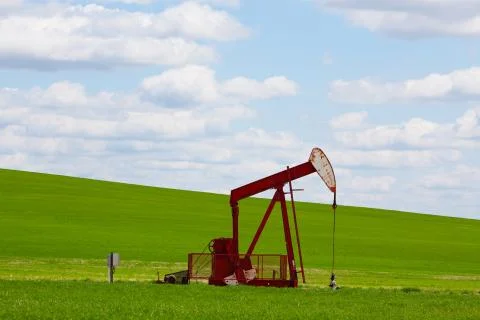 Red pumpjack Stock Photos