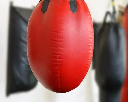 Red punching bag Stock Photos