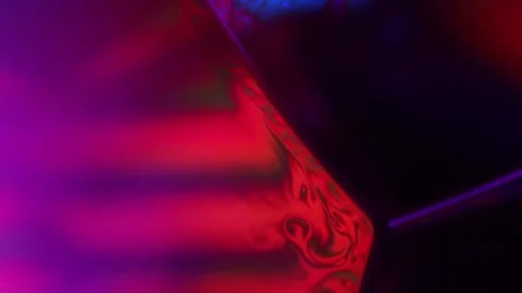 Red Purple multi-colored liquid in macro, color change and reflection Stock Footage 279669324
