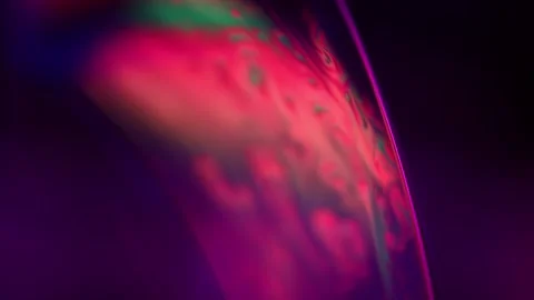 Red Purple multi-colored liquid in macro, color change and reflection Stock Footage 279669548