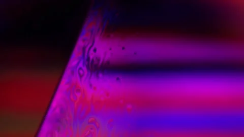Red Purple multi-colored liquid in macro, color change and reflection Stock Footage 279669726