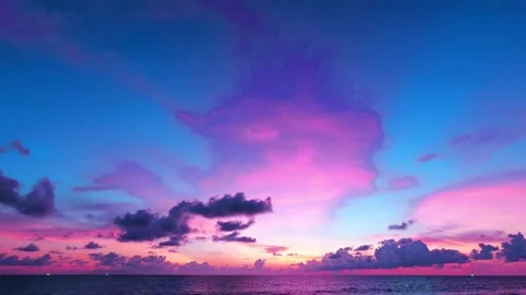 Red purple pink sunset clouds over sea water n ocean wave Video stock 154291923