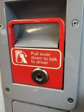 Red Push Bar Intercom Lever for Passenger Talk to Driver on Public Transport Stock Photos
