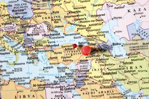 Red push pins on world map Stock Photos