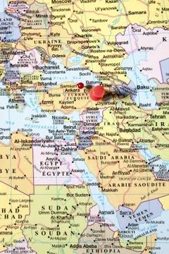 Red push pins on world map Stock Photos