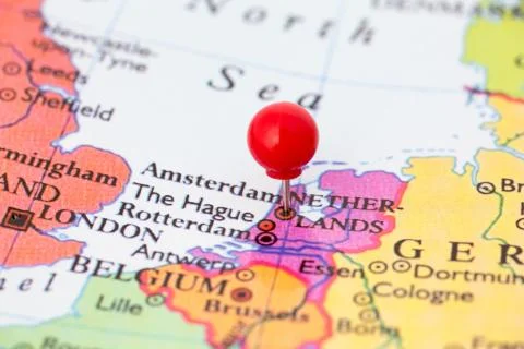 Red pushpin on map of netherlands Stock Photos