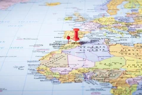 Red pushpin on a map Stock Photos