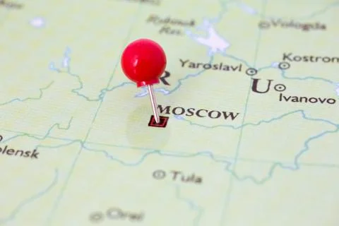 Red pushpin on map of russia Stock Photos