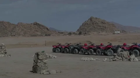Red quad standing in Sinai mountains near Sharm el Sheikh - Egypt 動画素材 235918655