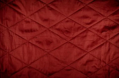 Red quilted material texture Stock Photos