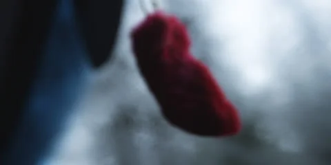 Red Rabbits Foot Hanging from Rear View Mirror Close Up Stock Footage 24201882
