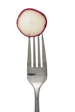 Red radish on fork Stock Photos