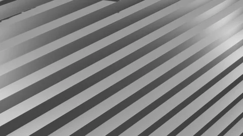 Red rag dolls roll down a gray staircase diagonally across the screen. Default Stock Footage 130967248