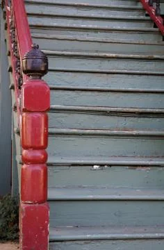 Red rail old gray steps Stock Photos