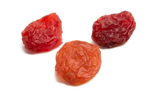 Red raisins isolated Stock Photos