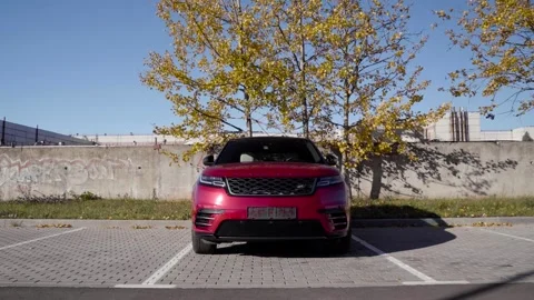 Red Range Rover Velar. Standing in the parking lot . Top View Stock Footage 254815037