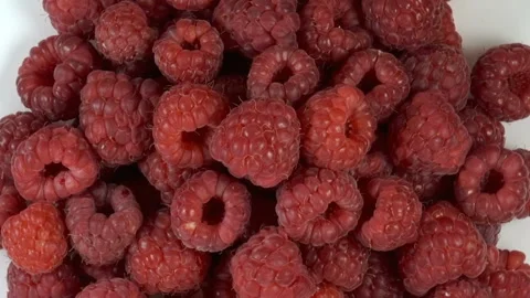 Red raspberries rotate Stock Footage 154858100