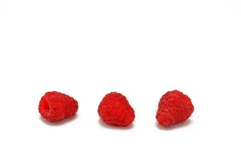 Red raspberry berries close up isolated on white background Stock Photos