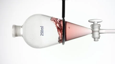 Red raspberry extract splash in separatory funnel dynamic view Stock Footage 341838091