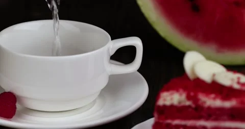 Red raspberry tea with pieces of fruit and berries Stock Footage 212319886