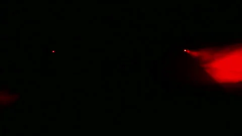 Red rays of light from profile spotlights in a smoke blanket. 库存影片 116704985