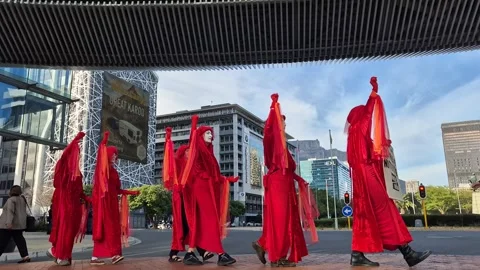 Red Rebel Brigade Silent Protest at African Energy Week, Cape Town 2025 Stock Footage 337914029