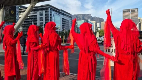 Red Rebel Brigade Silent Protest at African Energy Week, Cape Town 2025 Stock Footage 337914033