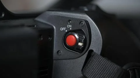 Red record button of black professional camcorder Stock Photos