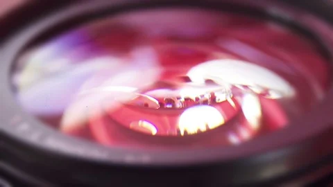 Red Reflection in Lens Glass Stock Footage 77570518