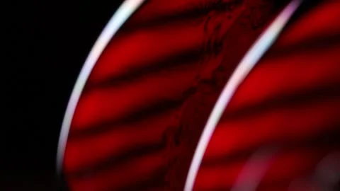 Red reflections of liquid in macro, dark horror background, red sphere Stock Footage 280778064