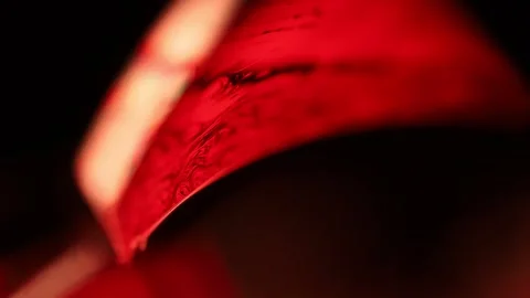 Red reflections of liquid in macro, dark horror background, red sphere Stock Footage 280778459