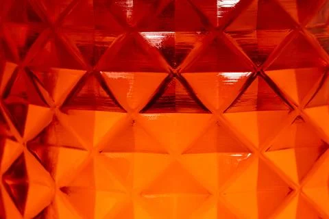 Red reflector texture background macro orange geometric glass close up Stock Photos