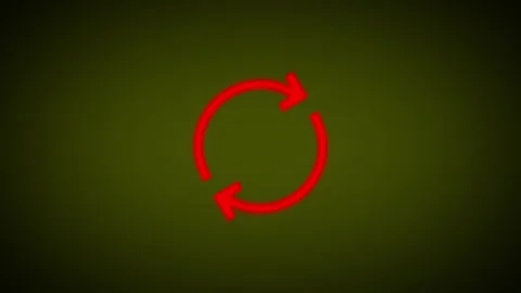 Red refresh or reload icon rotates on dark background representing concepts.. Stock Footage 345547680