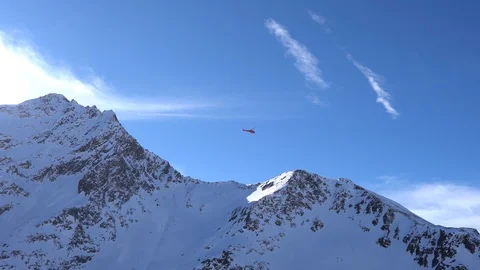 Red rescue helicopter flying Stock Footage 125849848