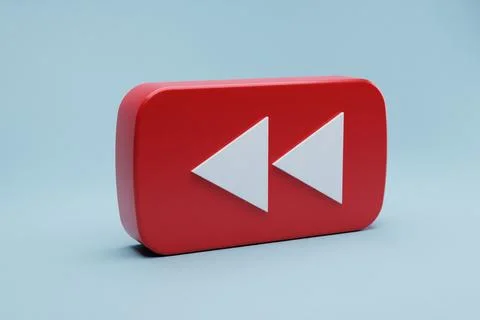 Red rewind button, 3D render, blue background, video playback Stock Illustration