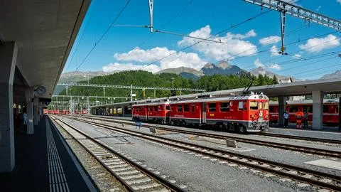 Red RhB train at St. Moritz railway station in the Swiss Alps, Europe Stock Photos