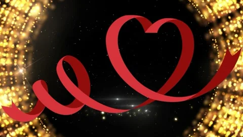 Red ribbon forming a floating heart shape against a shimmering golden bokeh 스톡 동영상 343819002