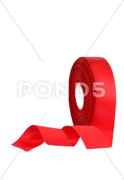 Red ribbon roll on a white background Stock Photos