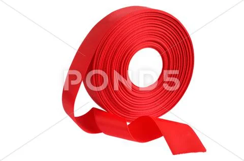 Red ribbon roll on a white background Stock Photos