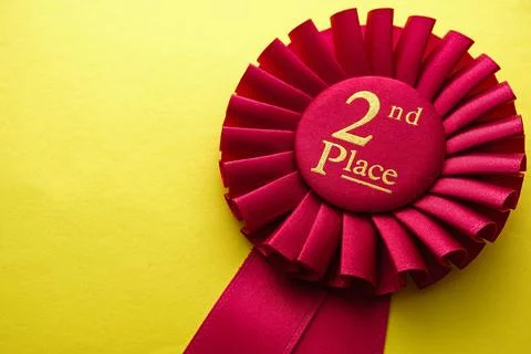 Red ribbon rosette for the second place runner up Stock Photos
