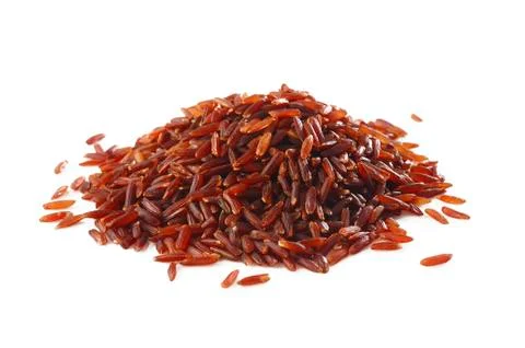 Red rice on white Stock Photos
