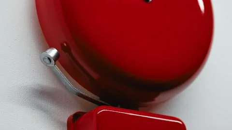 Red Ringing Bell on the School Wall Stock Photos
