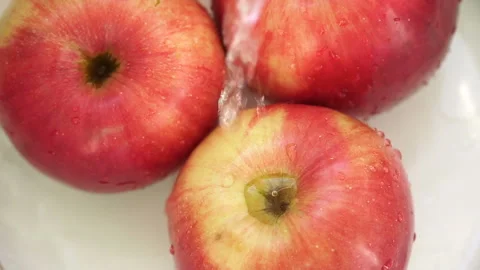 Red, ripe Apple watered, close-up Stock Footage 90290997