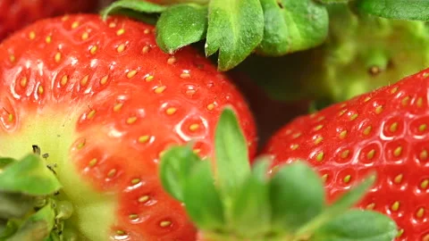 Red ripe strawberries macro, rotating slow motion Stock Footage 301412033