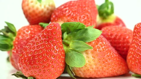 Red ripe strawberries on white background, macro closeup Stock Footage 301412233
