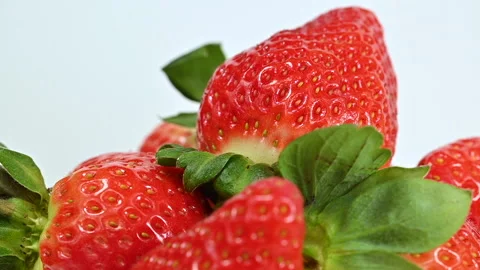 Red ripe strawberries on white background, macro closeup Stock Footage 301448201