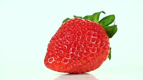 Red ripe strawberry on white background macro closeup Stock-Footage 301569909